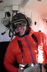 Richard Youd in a helicopter near Davis Station. Photo Copyright Phill O'Brien. 