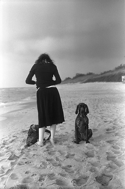 A girl and a dog, photo by Andrej Vasilenko