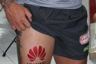 A fake tattoo on the leg of Canberra Raiders footballer Sandor Earl, sent by Huawei as an April Fool