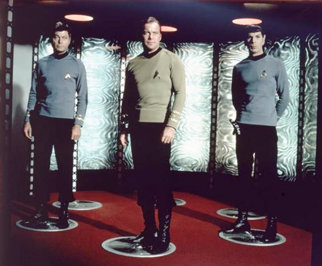 Bones, Kirk and Spock prepare to transport in Star Trek