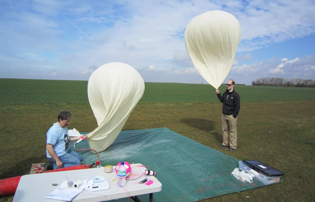 Dave Akerman and Eben Upton with the two balloons