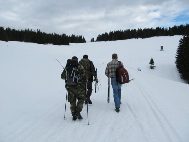 The AVA recovery team trekking up a mountain