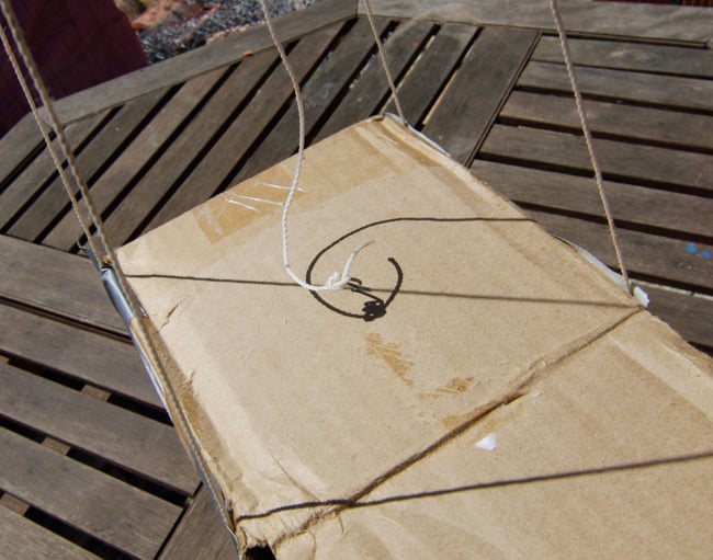 The igniter line attached to a length of steel wire poked into the top of the box