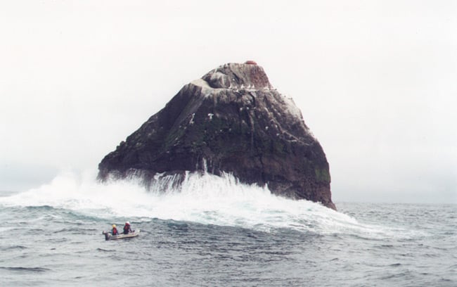 The inflatable approaches a swell-lashed Rockall in 2003