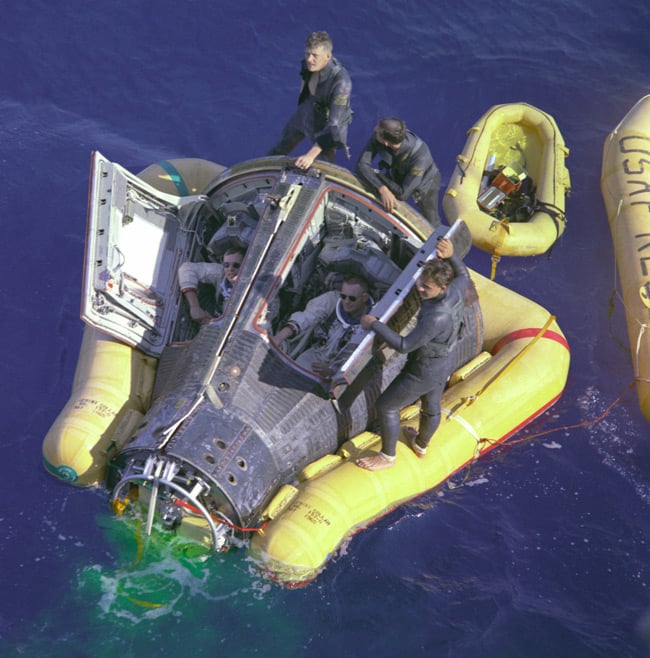 Astronauts Neil Armstrong and David R. Scott sit with their spacecraft hatches open while awaiting the arrival of the recovery ship, the USS Leonard F. Mason, after the successful completion of their 1966 Gemini 8 mission. Pic: NASA