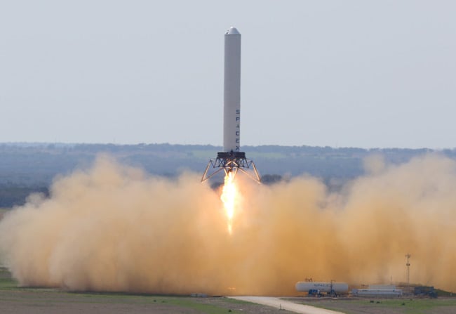 SpaceX's Grasshopper rises 24 stories or 80.1 meters (262.8 feet), hovering for approximately 34 seconds and landing safely using closed loop thrust vector and throttle control. Pic: SpaceX