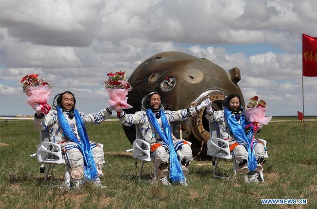 Taikonauts Zhang Xiaoguang, Nie Haisheng and Wang Yaping (from left to right)