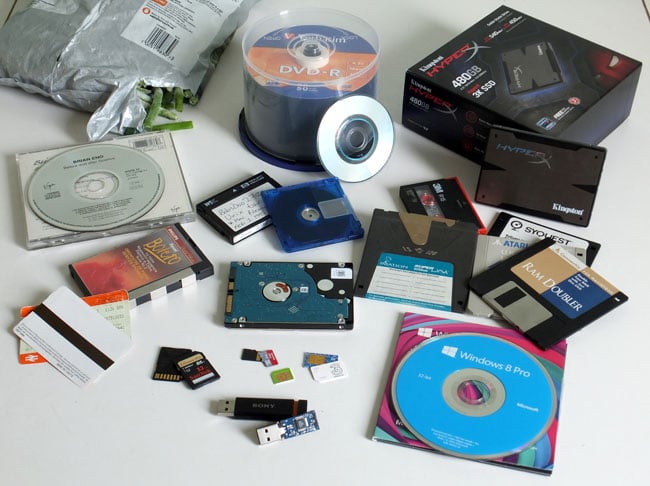 Data storage everywhere - CD, DVD, DAT, DCC, HDD, MiniDisc, SSD, SD card, floppy, magnetic stripe, barcode