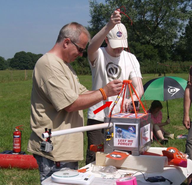 Paul Shackleton connects the igniter, which is tied to the payload box. Pic: Anita Wegner