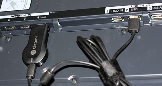 Photo of Chromecast plugged into an HDTV