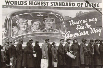 Americans queuing for free bread under a banner reading: World's highest standard of living ... the American way