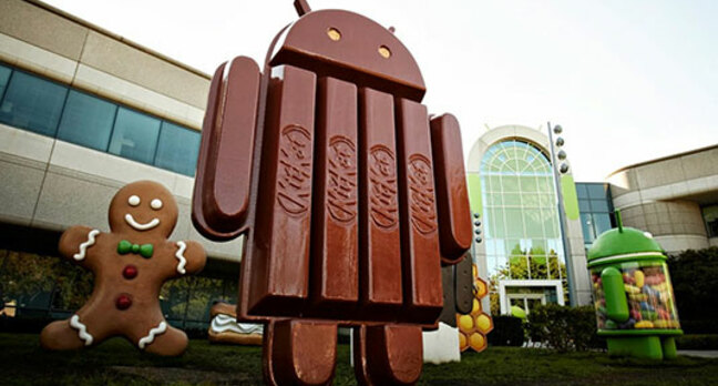 Photo of the KitKat mascot among the Android lawn statues