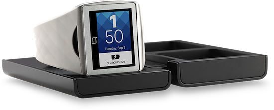 Qualcomm's Toq smartwatch in its charger slash case