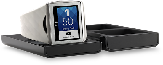 Qualcomm's Toq smartwatch in its charger slash case