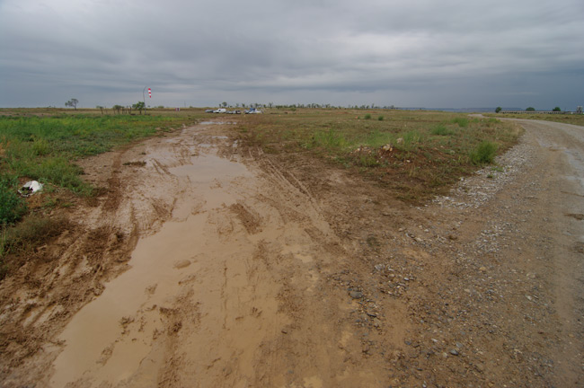 The muddy entrance to the launch site