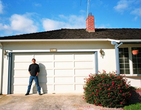 Steve Jobs in front of 2066 Crist Drive, Los Altos, California