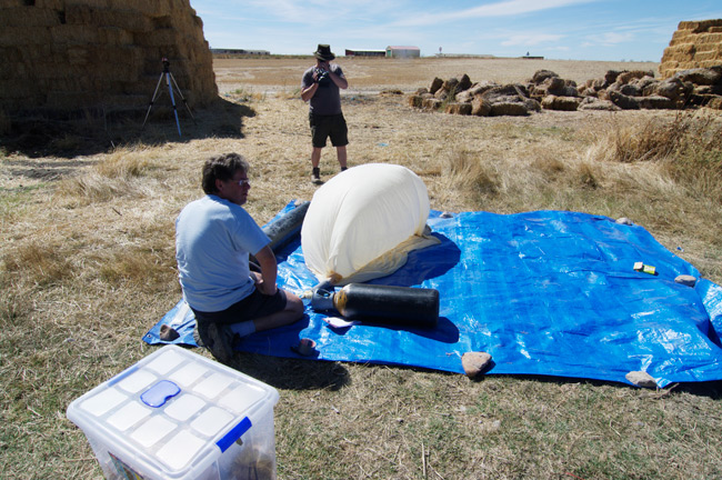 Dave Akerman begins to fill the balloon