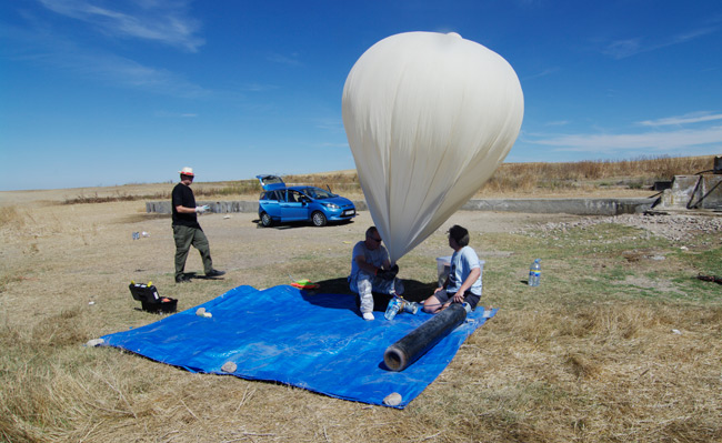 The balloon begins to swell