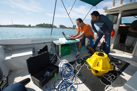 Electrical Engineering Graduate Students Hovannes Kulhandjian and Zahed Hossain of Tommaso Melodia’s WINES Lab Research on Lake Erie