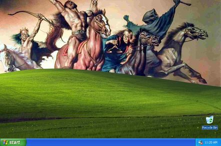 The Four Horsemen Apocalypse ride up the grassy mound that adorns the WinXP desktop