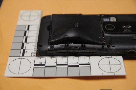 The rear of the phone, showing bullet damage. Pic: Winter Garden Police Department