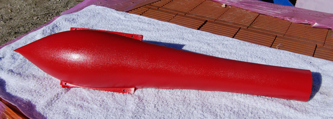 The underside of the Vulture 2's nose, with its red paintjob