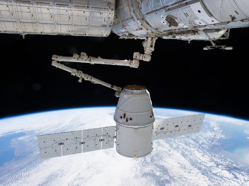 The Dragon capsule grabbed by the ISS's robotic arm in March 2013