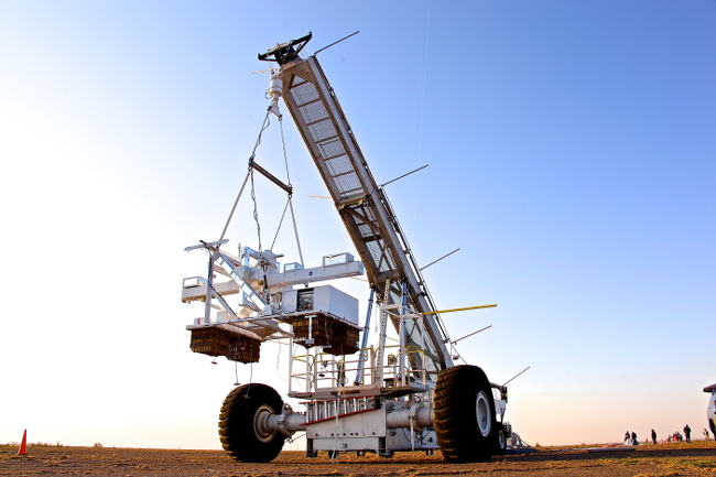 The Wallops Arc Second Pointer (WASP) payload suspended from a crane during a test deployment