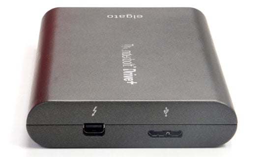 Elgato Thunderbolt Drive+ rubber bungs are provided to cover the ports in transit