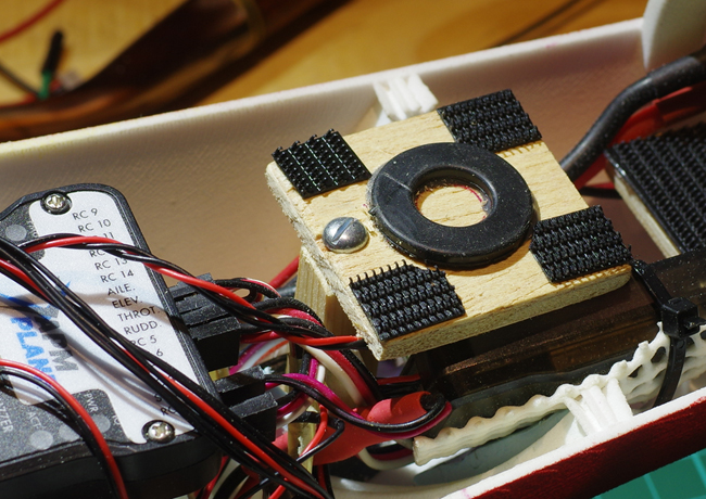 The wooden board for the GPS to sit on, with Velcro pads