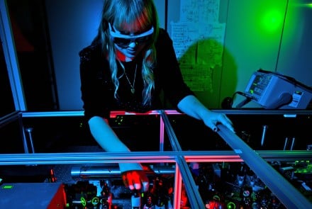 ANU student with quantum comms apparatus