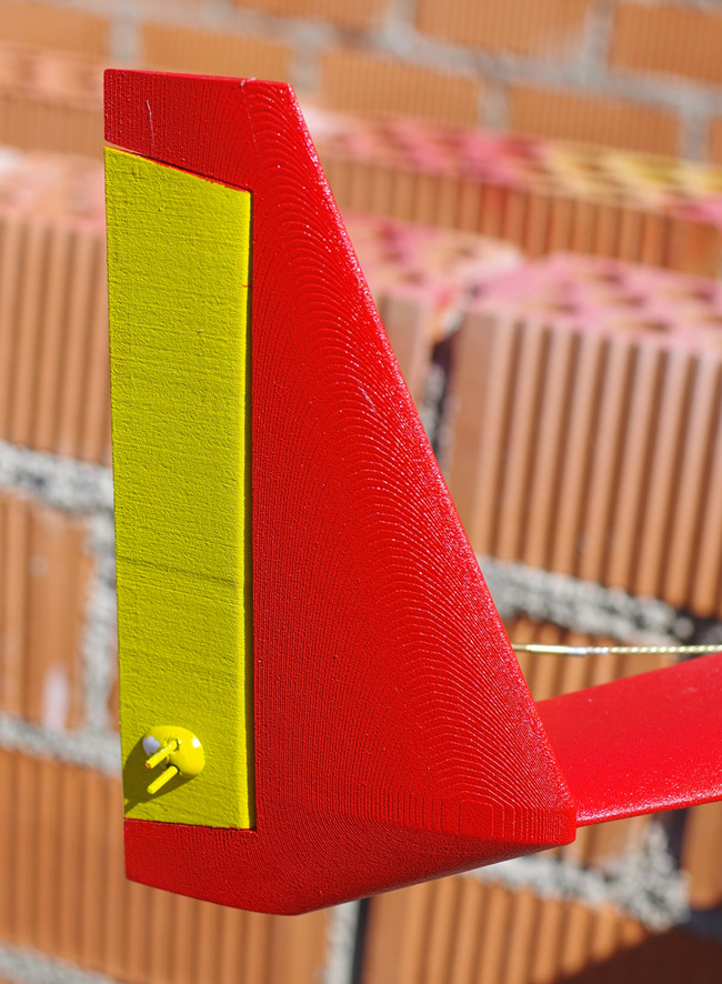 The finished rudder in red and yellow