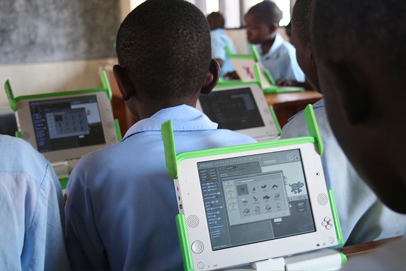 The One Laptop Per Child project: kids at the Kagugu Primary School, Kigali, Rwanda, get to grips with new computers
