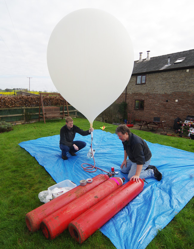 Dave and Anthony with the filled balloon