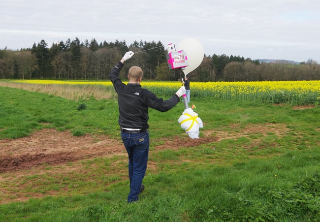 Anthony and Dave move the payload and balloon across the launch field