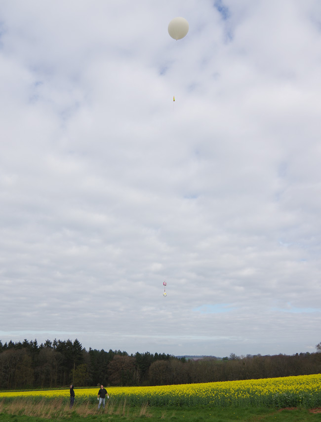 The balloon and payload rise into the air