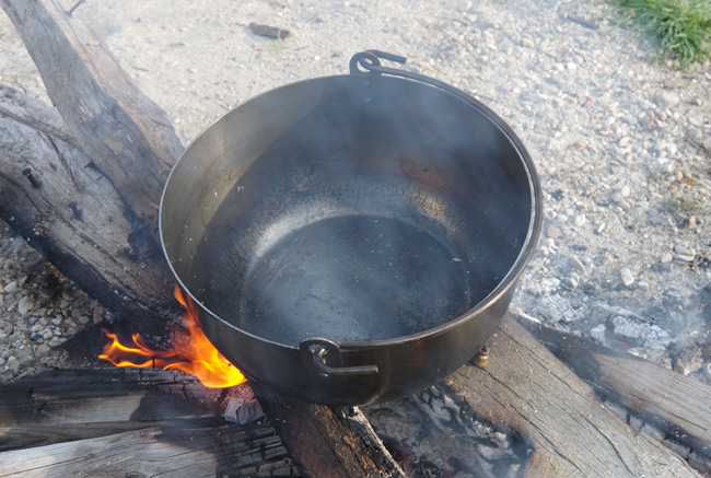 The pot on the fire during seasoning