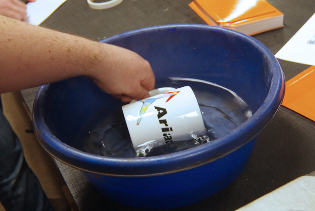 Cooling the mug in a bowl of water