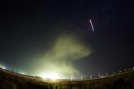 The Soyuz TMA-13M rocket is launched, as seen in this 30-second exposure at the Baikonur Cosmodrome. Credit: NASA/Joel Kowsky