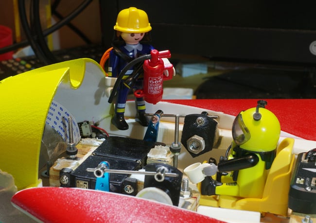 Close-up of the canards connections, with Playmonaut a miniature fireman