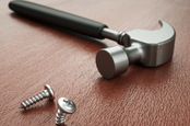 A hammer and bent screw