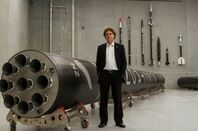 Rocket Lab's Peter Beck with a model of Rutherford