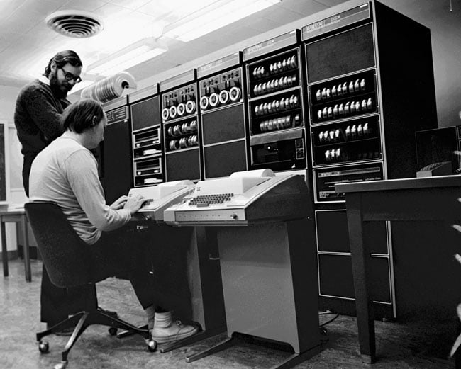 UNIX developers Ken Thompson and Dennis Ritchie working on a DEC PDP-11 minicomputer