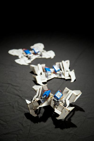 Three stages of the origami robots assembling