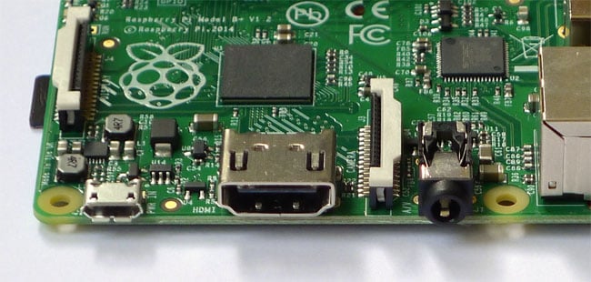 HDMI joined by power (left) and analog AV B+ raspberry pi