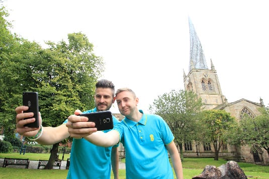 Chesterfield’s twisted spire: Local Store Manager, Adam Osowski, with fellow EE employee