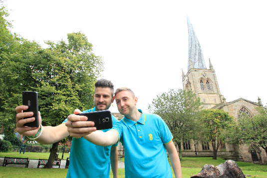 Chesterfield’s twisted spire: Local Store Manager, Adam Osowski, with fellow EE employee