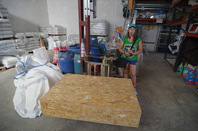 Kati with the box on the scales