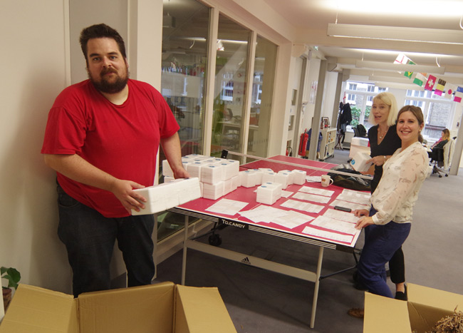 Chris and the PR girls label some mugs