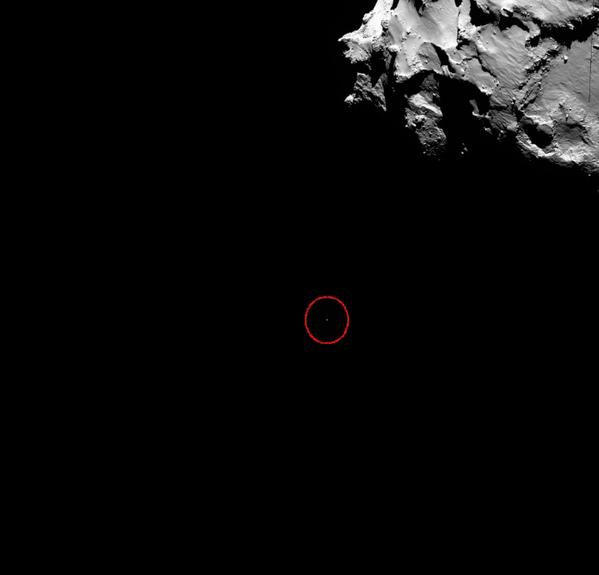 Rosetta's OSIRIS snaps Philae as a dot on its way to Comet 67P